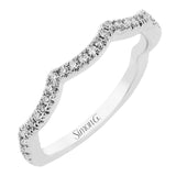This delicate engagement ring features an infinity twist design with a high polish side, and a diamond accented side 0.15 ctw., set in 18K white gold.