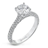 This stunning 18K engagement ring has pave set diamonds of 0.66 ctw., on all 3 sides for a sleek look