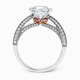 This exquisite white gold engagement ring is highlighted by .04 ctw of princess cut white diamonds and .34 ctw of round cut white diamonds.